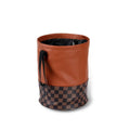 Retractable leather car interior bin showing waterproof construction with handle and folding mechanism