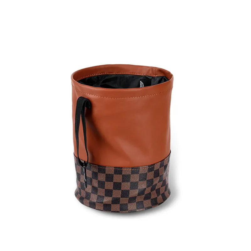 Retractable leather car interior bin showing waterproof construction with handle and folding mechanism