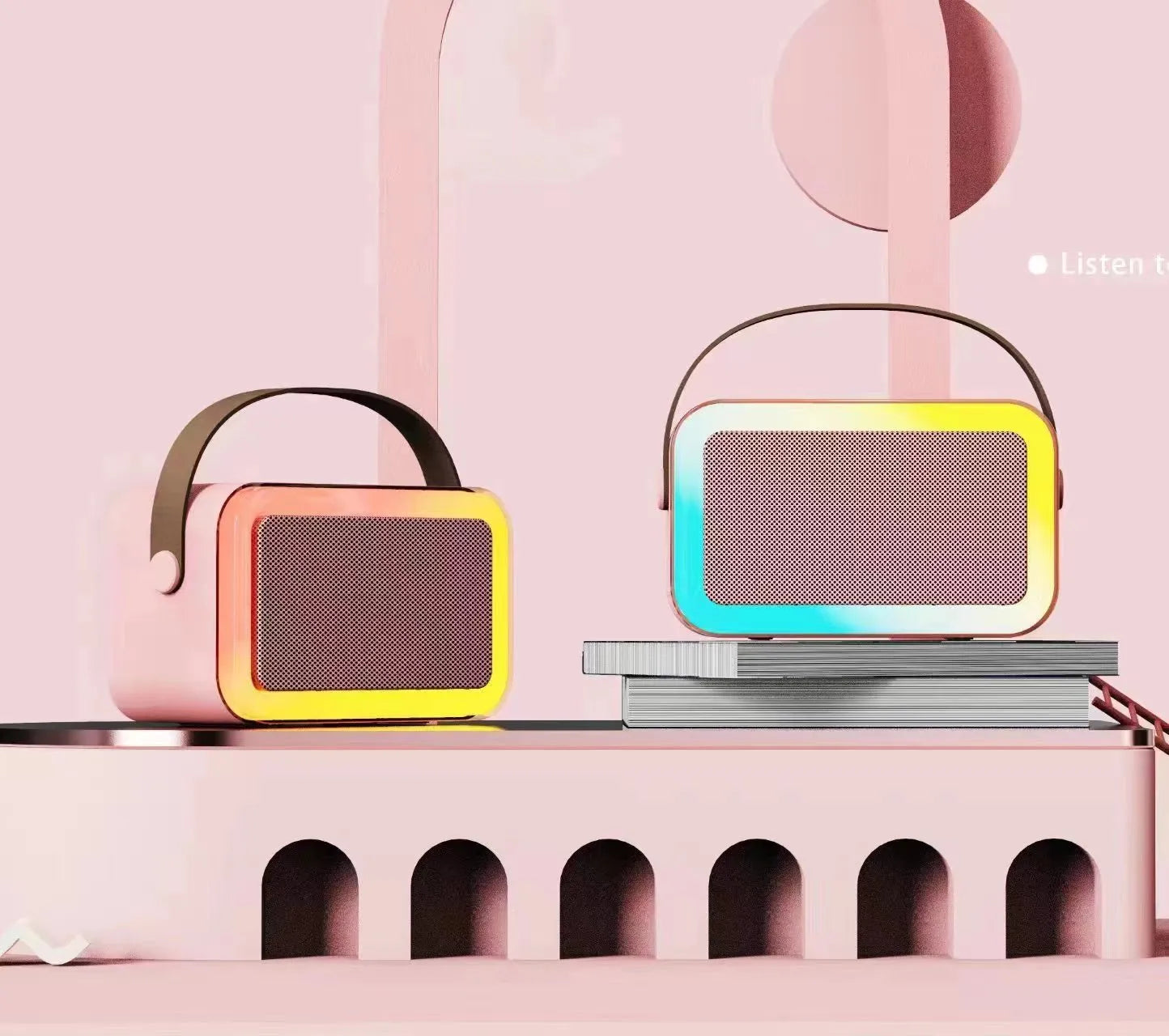 Pink portable Bluetooth karaoke speaker with coloured lights and built-in microphone on a white background.