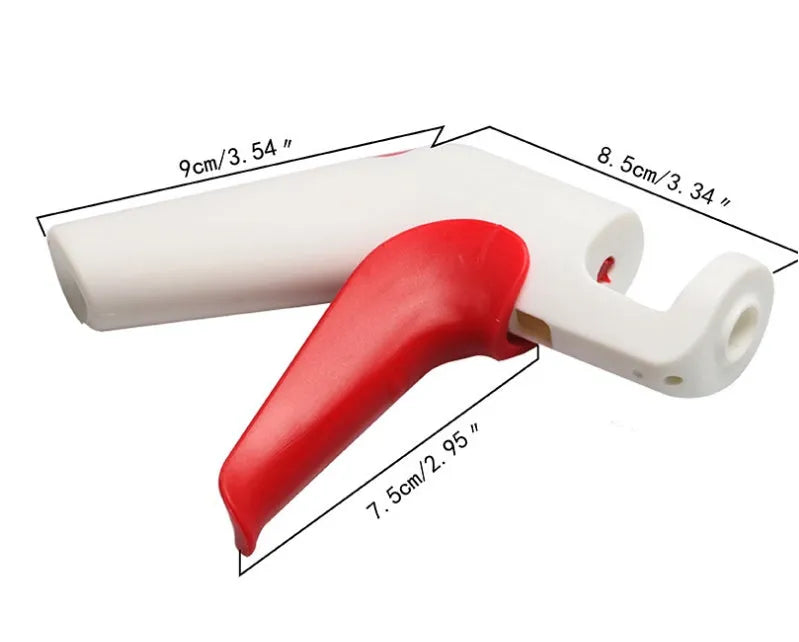 Stainless steel cherry kernel remover kitchen tool with red plunger and ergonomic handle.