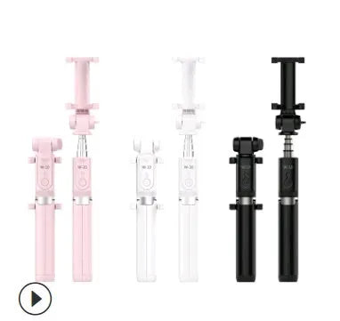 Bluetooth selfie stick tripod with remote control extended with smartphone attached