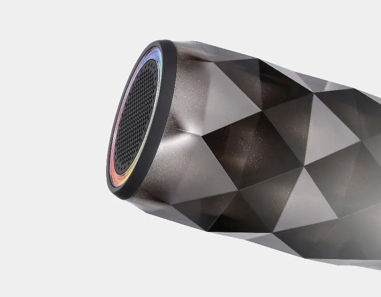Black crystal Coca-Cola can lantern speaker with diamond-cut design and colourful starry sky lighting effect.