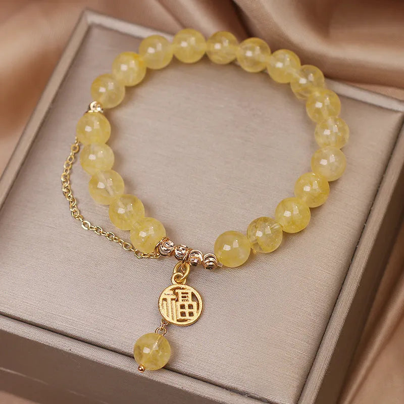 Natural citrine stone bracelet with electroplated metal and Chinese character tassel charm