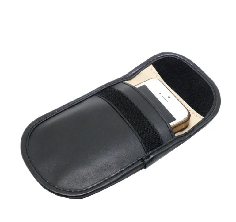 Black microfiber Faraday pouch for blocking mobile phone signals and shielding RFID cards.