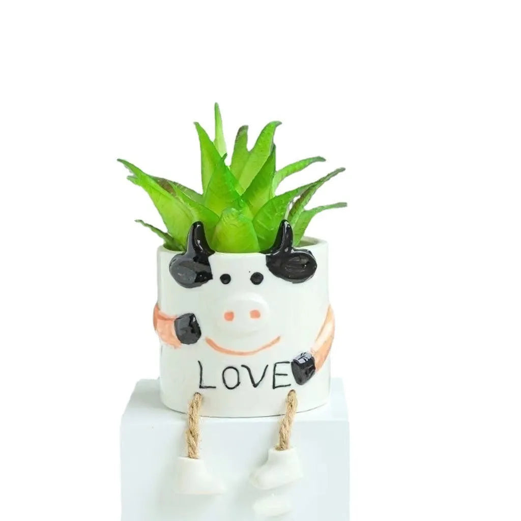 Ceramic hanging foot flowerpot for succulent plants in cartoon style with twelve colour variations on desktop