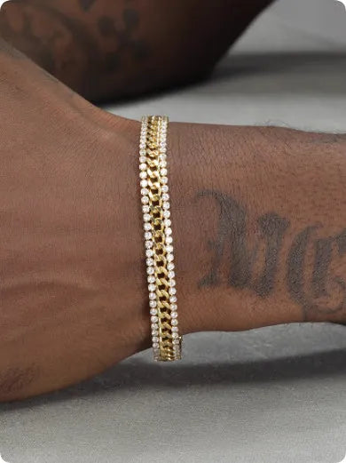 Gold plated tennis bracelet for men and women with stone inlay on a wrist.