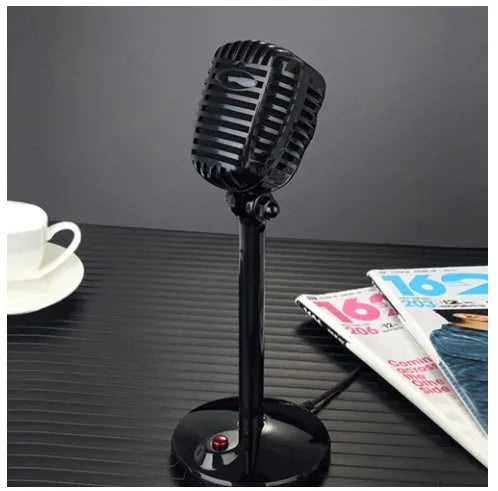 Black USB computer microphone with adjustable stand on desktop