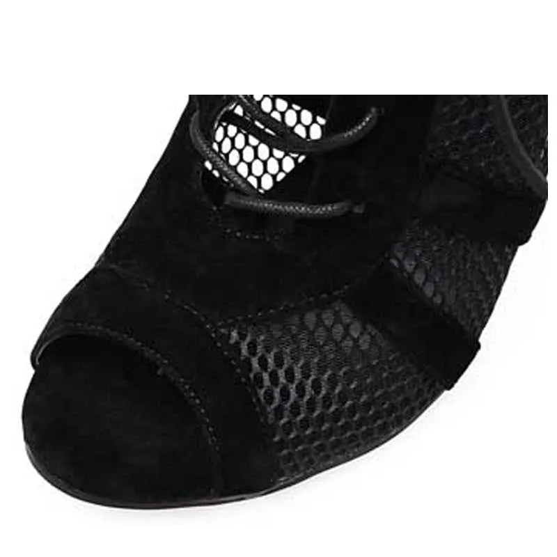 Black suede women's lace-up high heel shoes showing ankle strap and 11.5 cm heel.