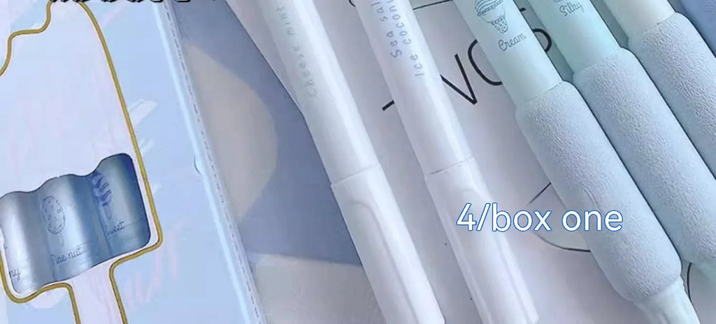 Four student calligraphy pens with 0.5mm double-headed fluorescent tips in plastic cases