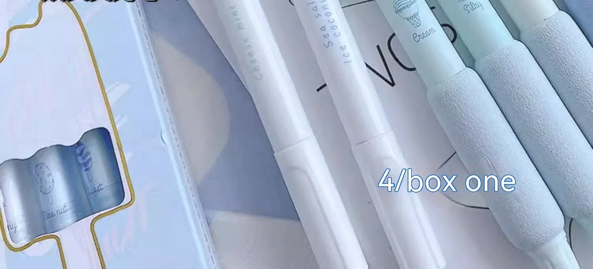 Four student calligraphy pens with 0.5mm double-headed fluorescent tips in plastic cases