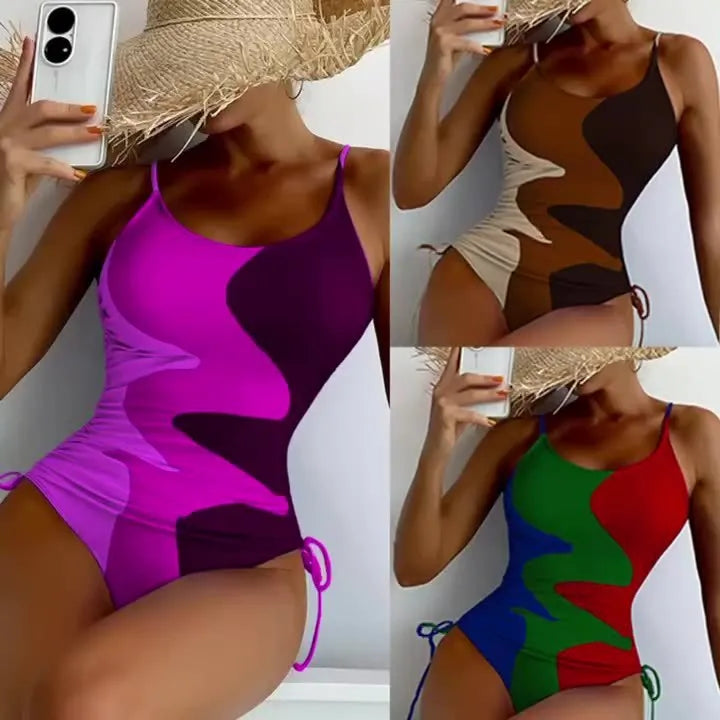 Women's blue one-piece sleeveless swimsuit with fixed swimming trunks on a mannequin.