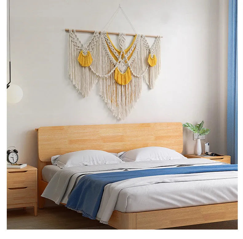 Hand-woven creamy white cotton tapestry with rectangular shape and textured surface