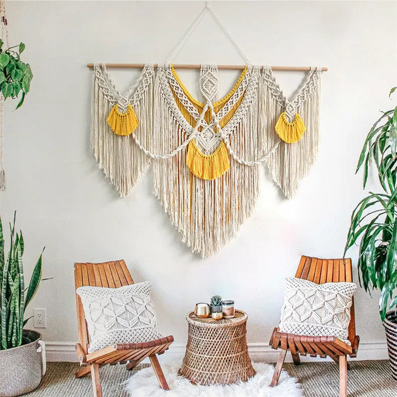 Hand-woven creamy white cotton tapestry with rectangular shape and textured surface