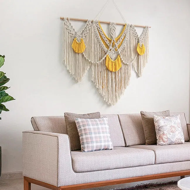 Hand-woven creamy white cotton tapestry with rectangular shape and textured surface