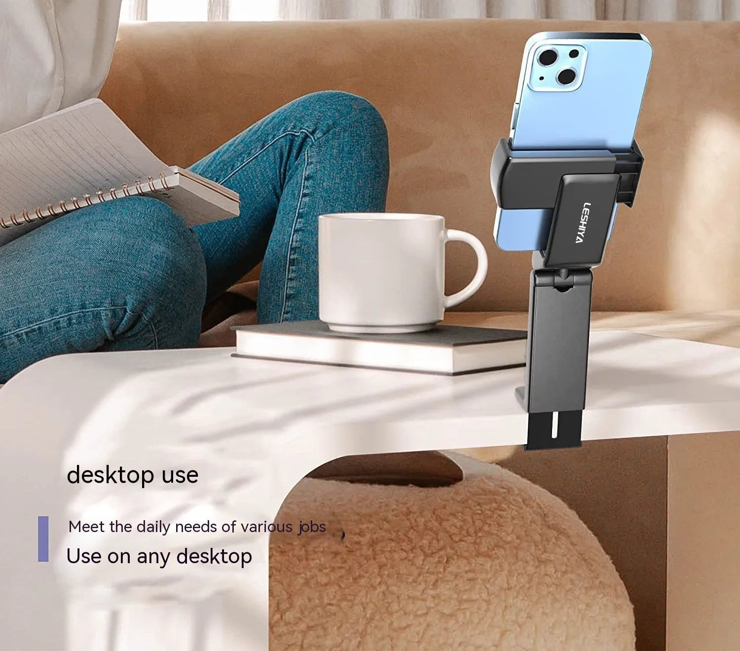 Black foldable rotating phone holder showing 360-degree adjustment for mobile devices