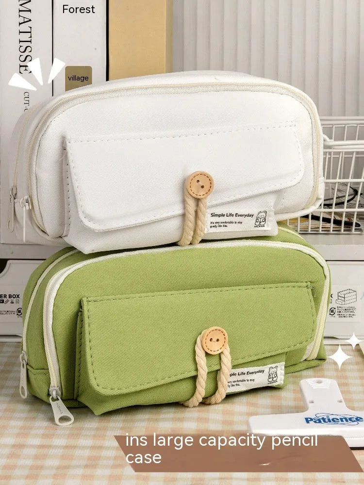 Korean style canvas pencil case in green colour with large capacity for approximately 80 pens