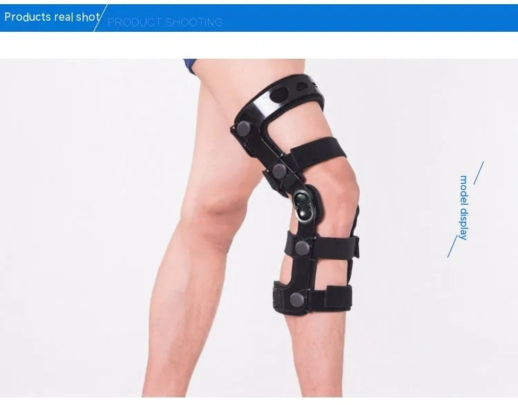 Black anterior ligament knee pad showing multi-material construction and sizing tags for left and right knees.