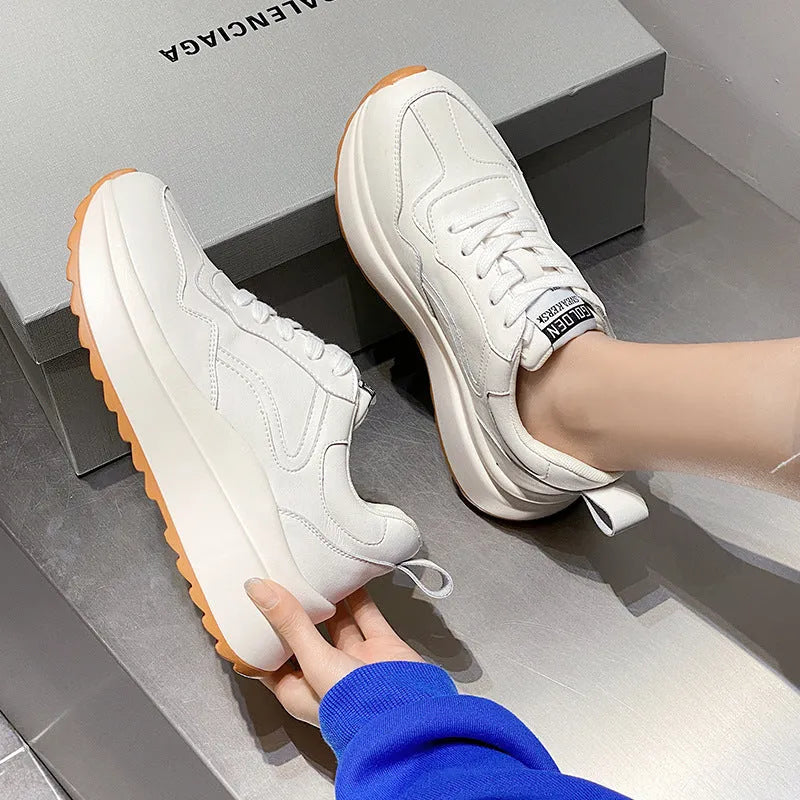 Women's white leather casual sports shoes with cross strap and English muffin heel detail