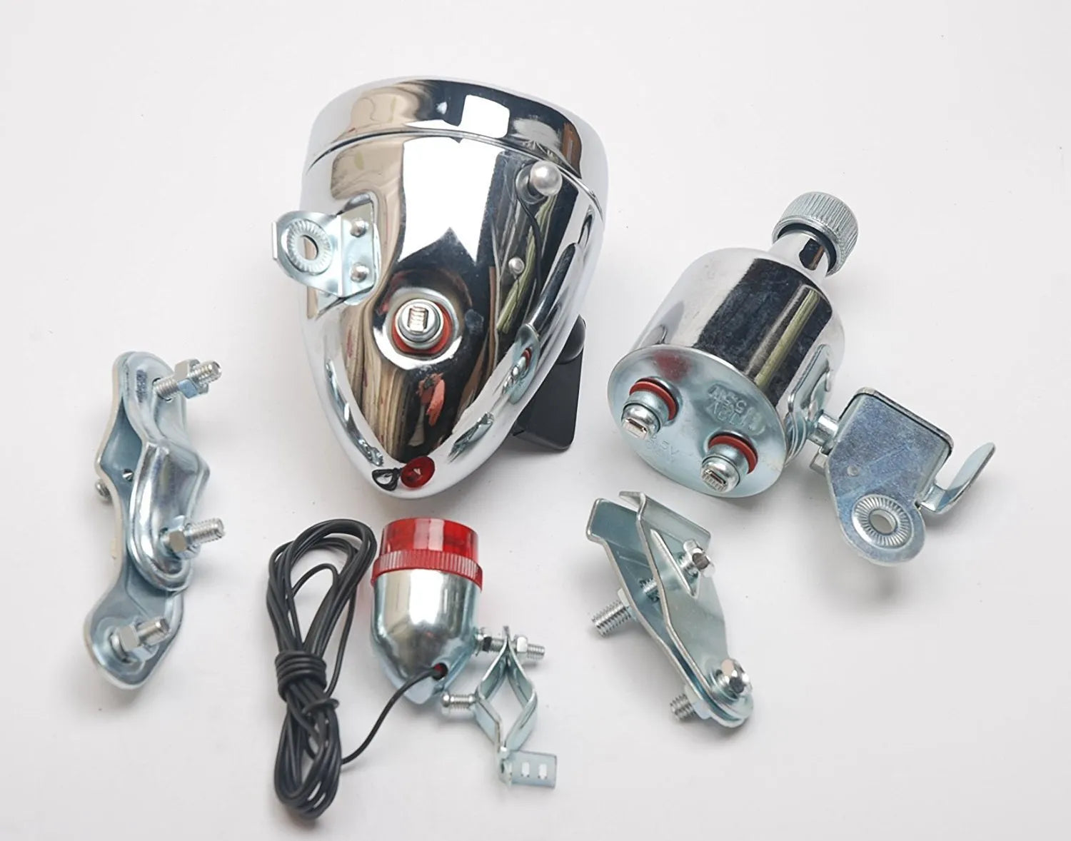 Silver bicycle dynamo generator light with friction drive mechanism and waterproof housing for 12V lighting systems