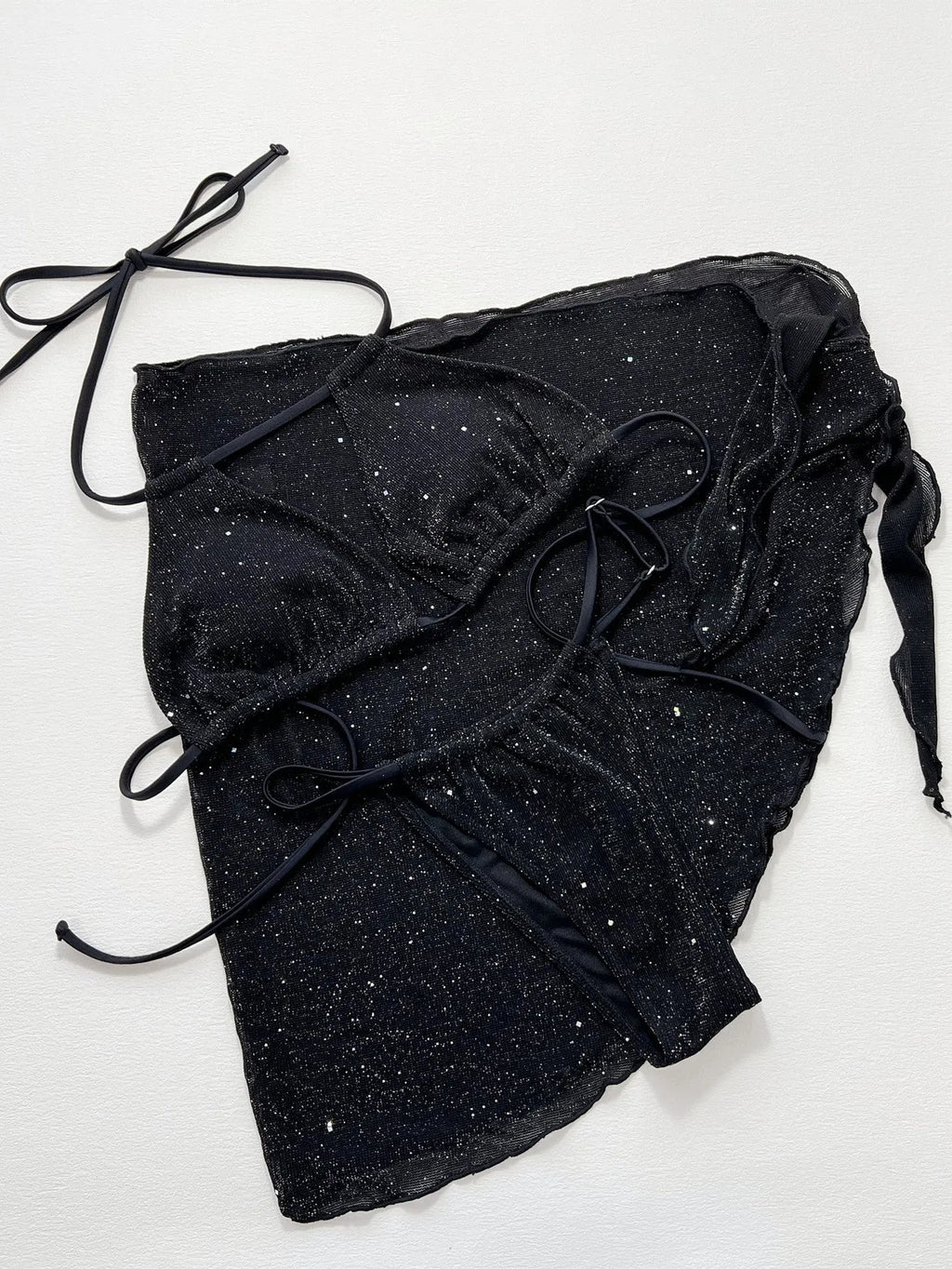 Black three piece bikini swimsuit set with separated top and shorts