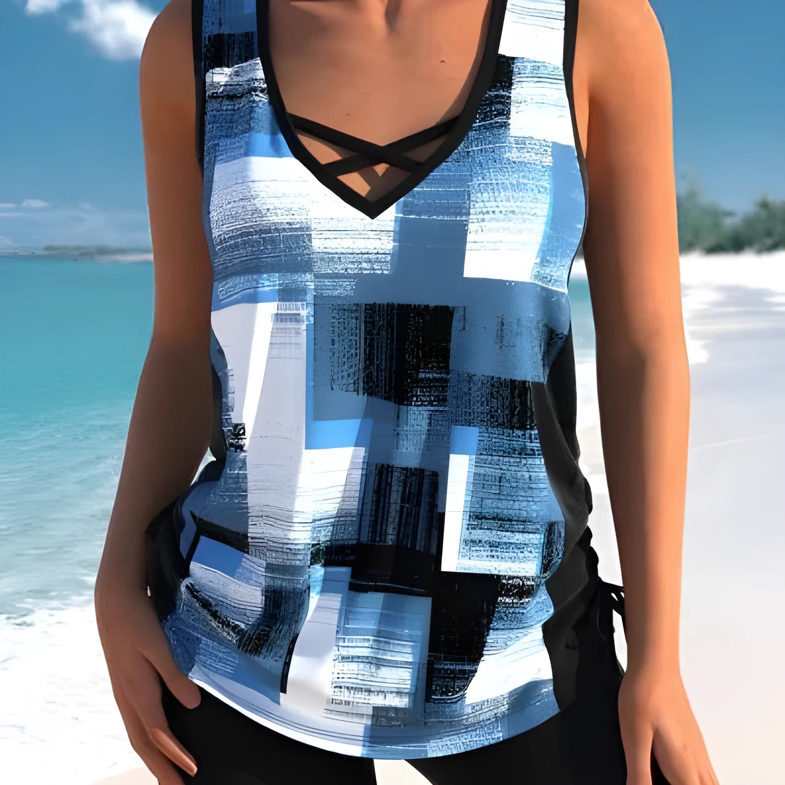 Women's printed split boxer swimsuit set with matching top in various colours and sizes.