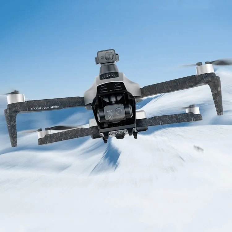 White folding quadcopter drone with camera and propellers, shown next to its remote control and shoulder bag.