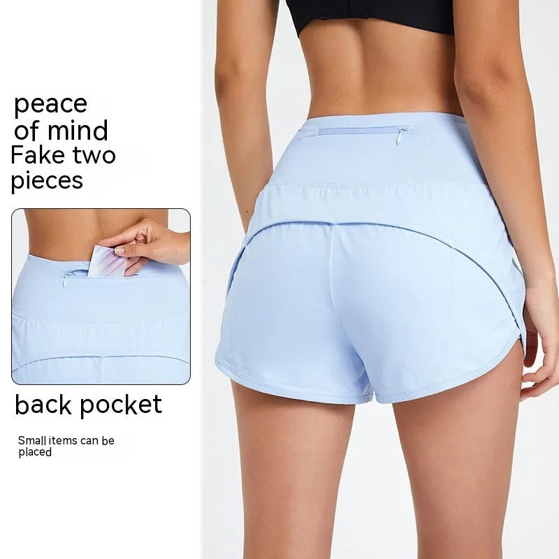 Nylon women's high-waist fitness shorts in black, shown on model for running or gym use.
