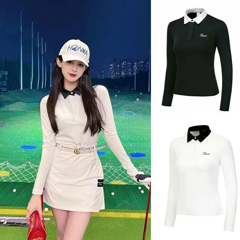 White slim-fit long sleeve women's golf top on a hanger