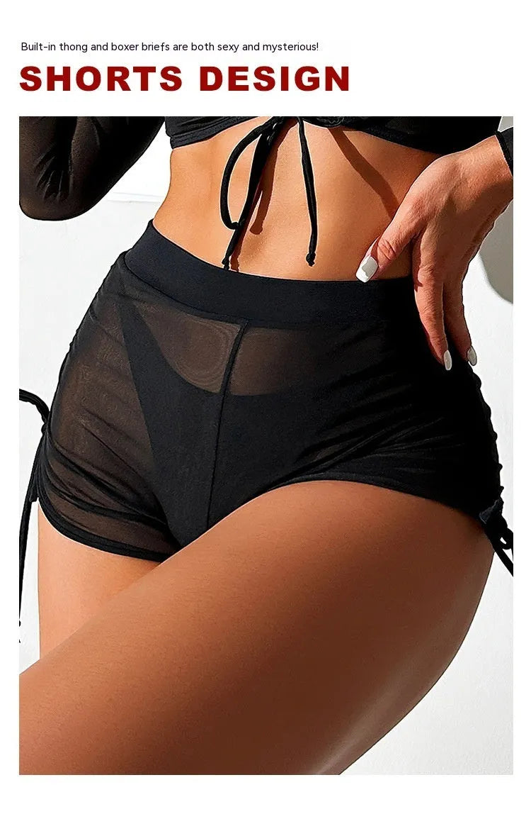 Black mesh four-piece women's swimsuit with long sleeves and briefs bottom