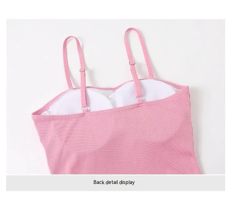 Women's long sleeve one-piece swimsuit in polyester fibre available in black or pink colours