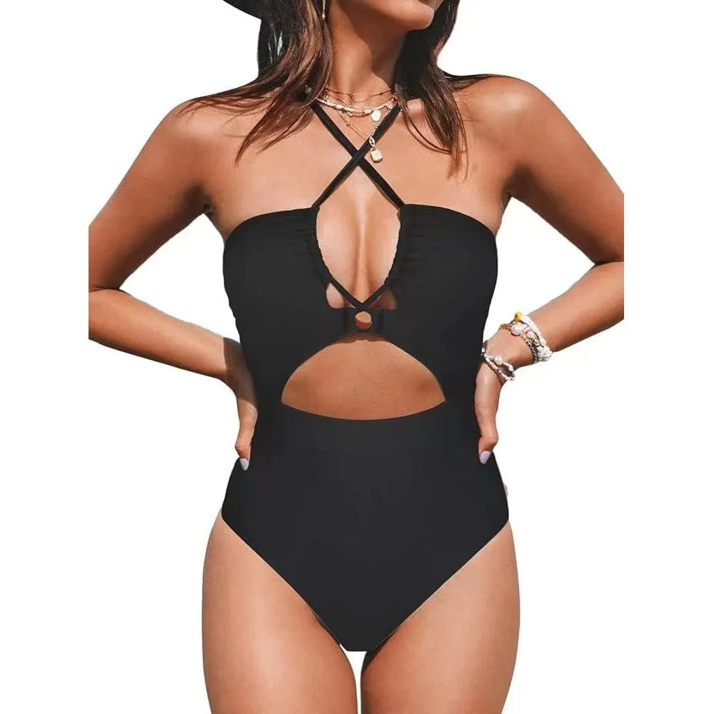 Black women's strapless one-piece swimsuit with cross-back detail on a mannequin.