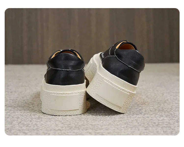 Women's black platform casual sports shoes with embossed cowhide upper and tied lace design