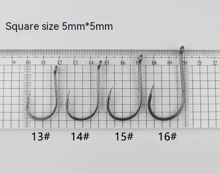 A selection of barbed, crooked mouth fishing hooks with ring holes made from alloy carbon steel.