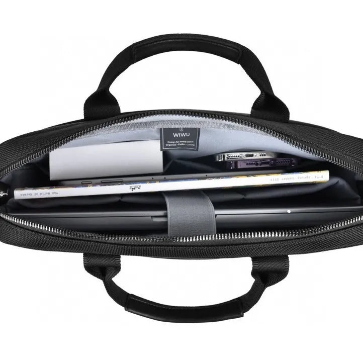 Black oxford cloth laptop handbag showing multi-pocket interior and separate padded computer compartment.