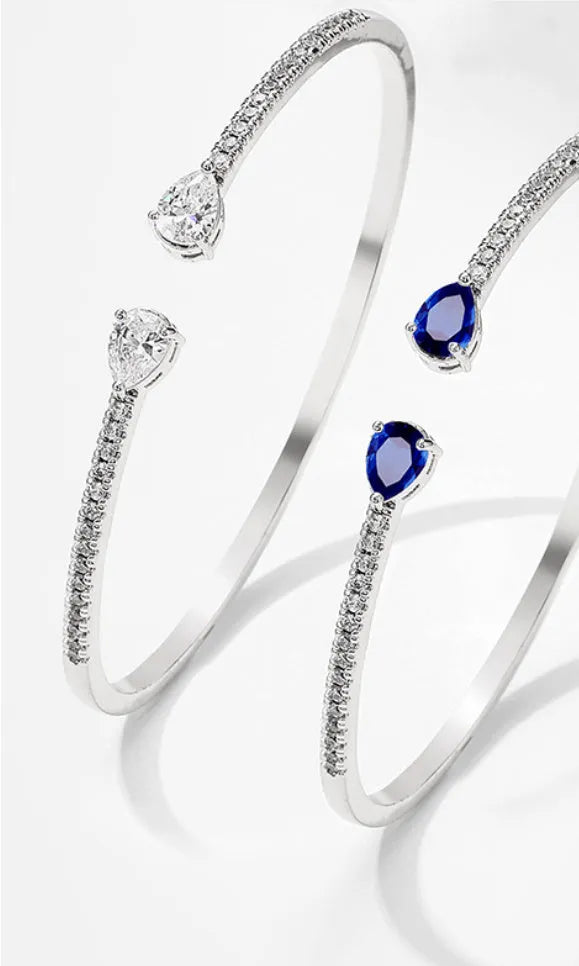 Personalised copper bracelet with multi-zircon inlay in white or blue colour option.