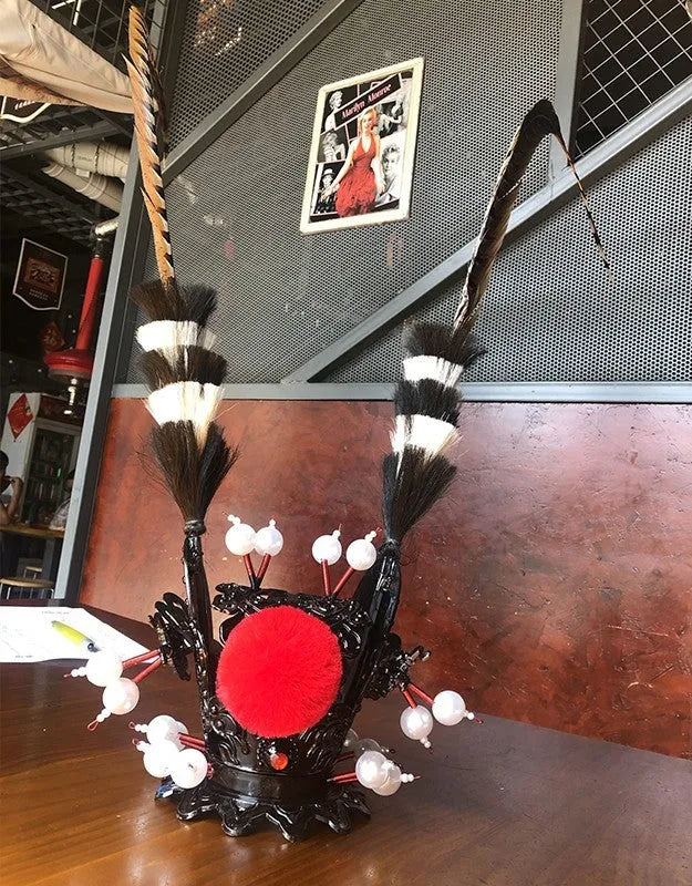 Black crown motorcycle helmet decoration with long gold quill feather plume
