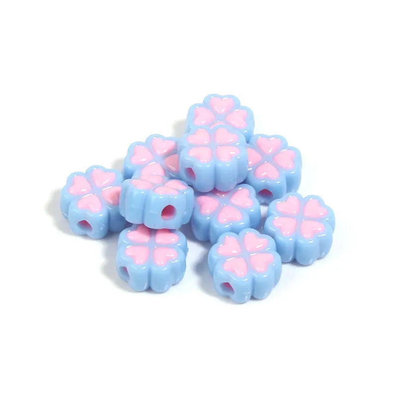 Acrylic four-leaf clover love beads with frosted finish in assorted light colours, 15mm size
