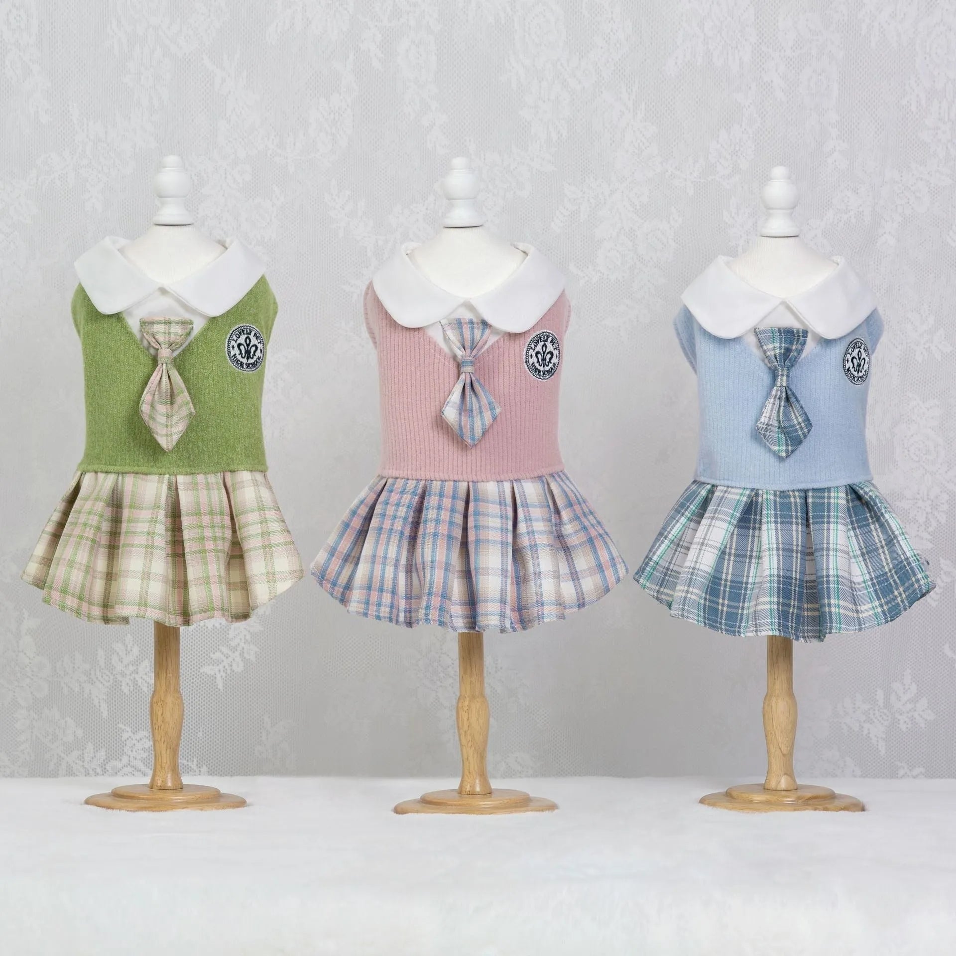 Pink, blue, and green tartan princess skirt for small and large dogs and cats on a white background.