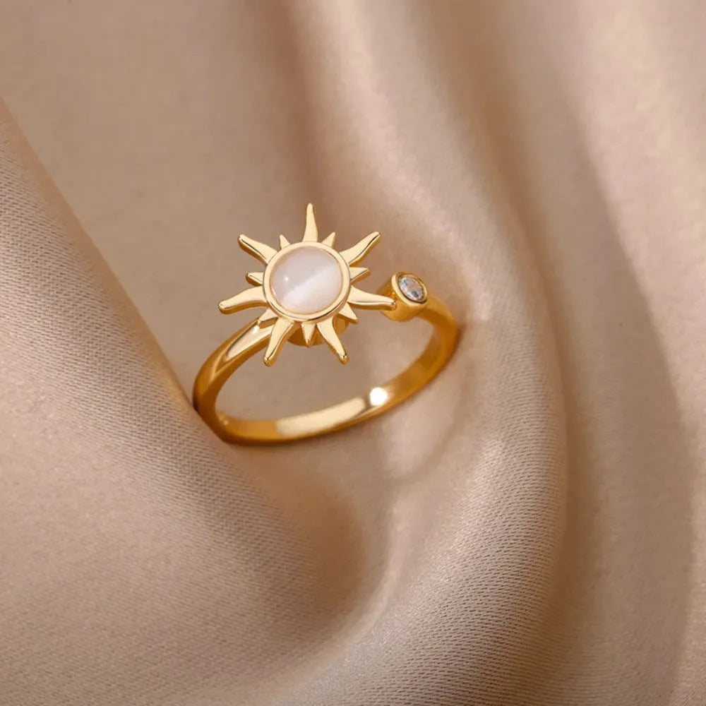 Simple copper adjustable decompression ring in gold or platinum finish, showing open mouth design.