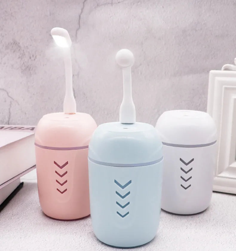 X3 portable car humidifier in columnar design with USB cable, showing blue colour option
