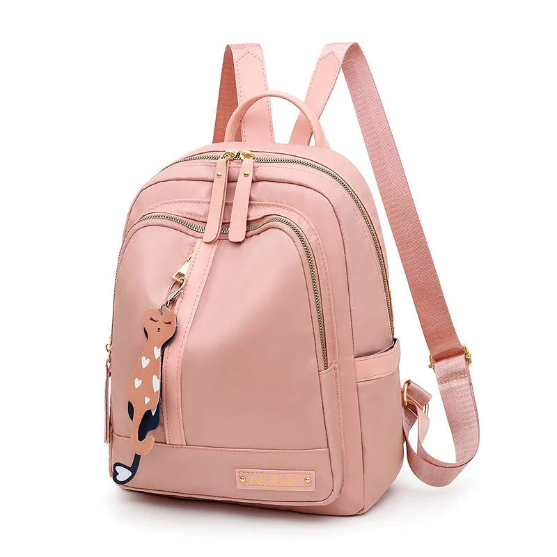 Men's black casual backpack showing multiple compartments and shoulder straps