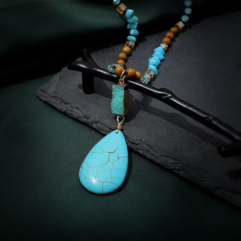 Turquoise water drop imitation mineral pendant on mixed material ball bead necklace chain