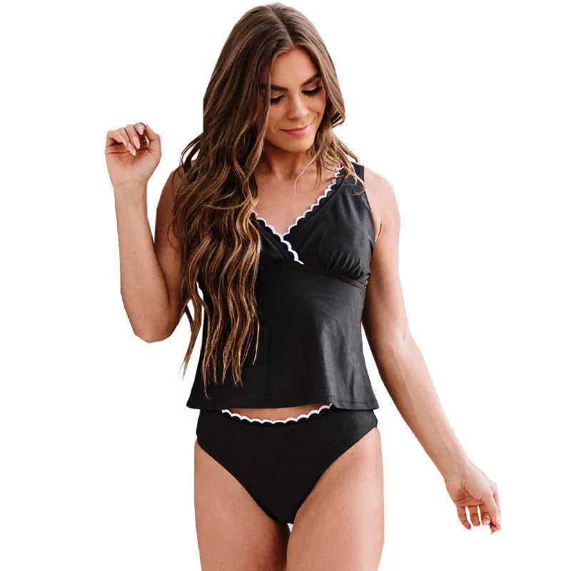 Black women's one-piece swimsuit with sleeveless design and split-side construction