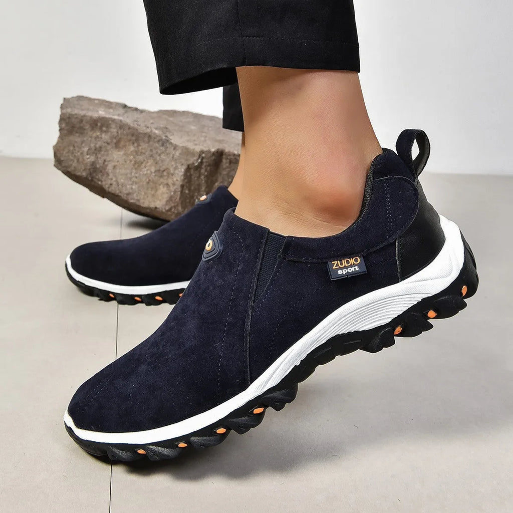 Men's round head shallow mouth thin shoes in gray, shown from the side.