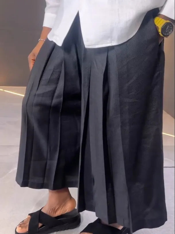 White asymmetric front shirt with black pleated trousers casual co-ord set