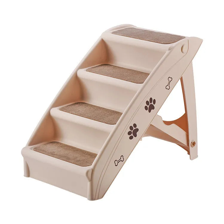 Foldable plastic pet stairs with non-slip surface in beige colour beside a sofa