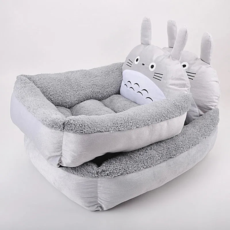 Cartoon-style washable pet sofa bed for small dogs and cats in a blue colour.