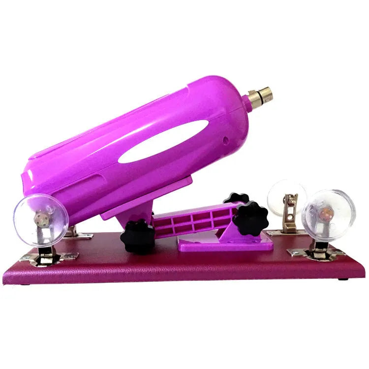 Purple automatic telescopic thrusting sex toy for women on a white background.