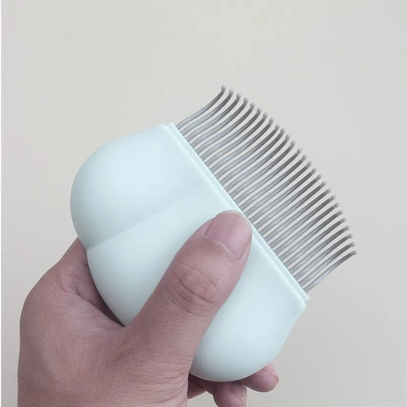 Paw Soft deshedding brush for cats and dogs in blue, pink, or white, shown with dimensions of 9cm by 9cm.