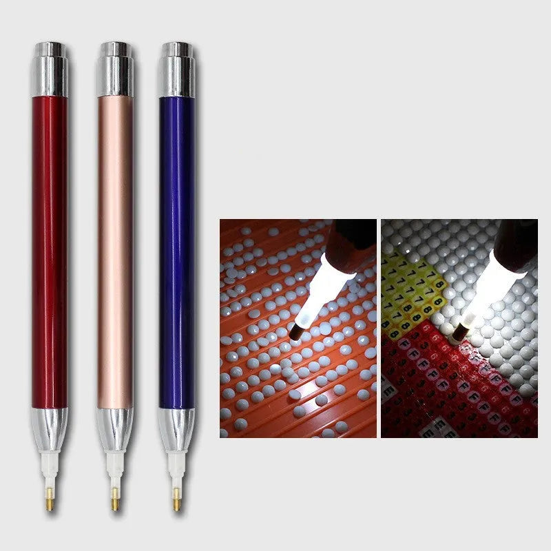 Aluminium alloy luminous single-head diamond painting drill pen in blue, gold, or red colours.